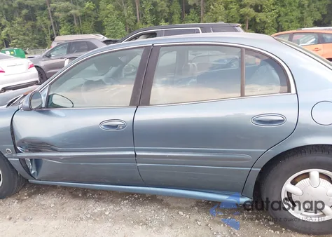 2000 Buick Lesabre Custom z USA, uszkodzony, nr VIN 1G4HP54K8Y4136139